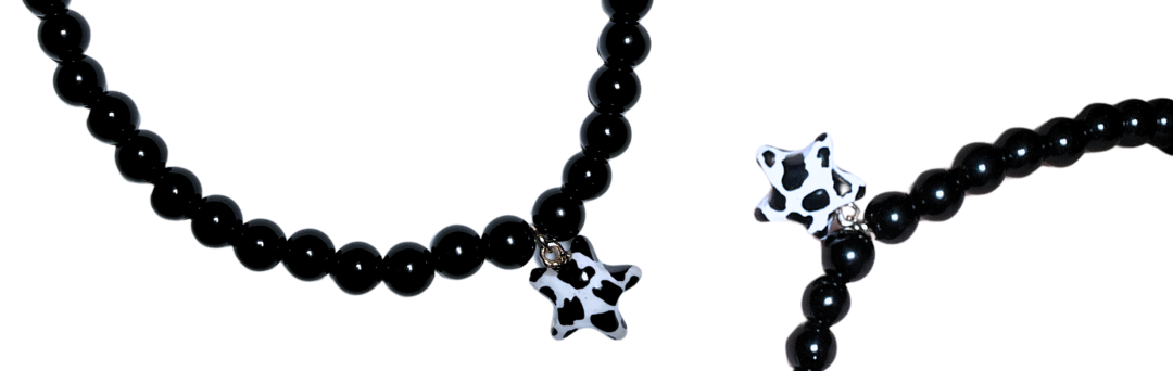 NASZYJNIK Z CZARNYCH PEREŁ Z GWIAZDKĄ KRÓWKA - obrazek 4